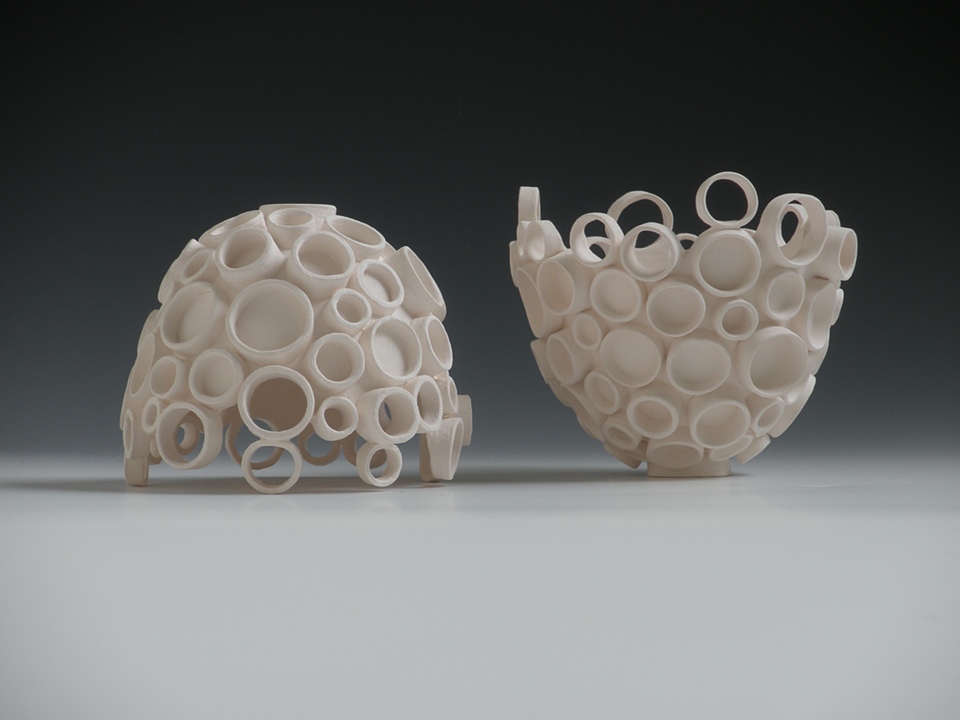 Porcelain Ceramic Art.  Wheel Thrown, Hand-built, Vases and Vessels for light and home installation.  Katherine Dube; Dube Ceramic Art and Design 2010